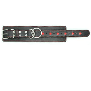 Observe an image of Leather Thigh Ankle and Wrist Cuffs for Sex Slave Punishment in black and red color with a belt-like locking mechanism for quick release.