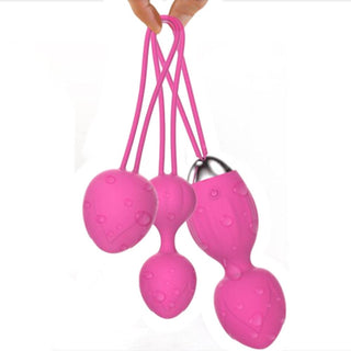 Displaying an image of Vagina Tightening Remote Control Kegel Balls set in Rose and Purple colors made from silicone and ABS materials.