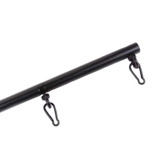 Metal bar in black finish designed for comfort and safety in intimate play.
