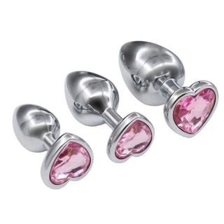 Pictured here is an image of heart-shaped butt plugs in small, medium, and large sizes