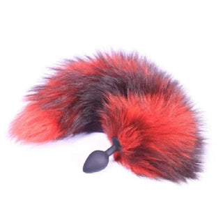 Red and Black 16 Fox Tail Silicone Butt Plug - A sensual image of the silicone plug with a long and lush red and black faux fur tail.