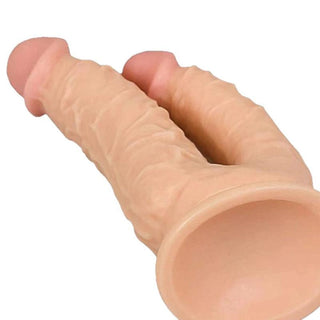 This is an image of Simultaneous Stimulation Double Penetration Dildo with a strong suction cup for hands-free riding.