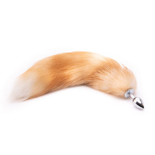 What you see is an image of 16 - 17 Light Brown Fox Tail Metal plug with silver color and teardrop shape