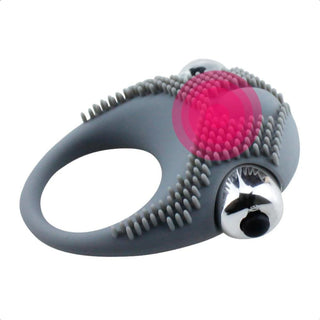 Mind-Blowing Silicone Bullet Vibrating Cock Ring Sex Toy For Couple with textured surface for enhanced stimulation.