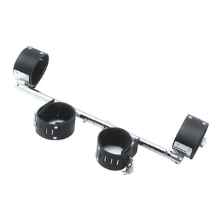 This is an image of Adjustable Stainless Leg and Leather Spreader Toy Bar with adjustable, cushioned cuffs designed for prolonged passionate play and maximum comfort.