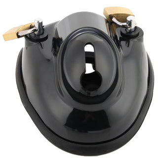 Observe an image of the unique spaceship-like shape of Extreme Confinement Chastity Cup with two inclusive cock rings.