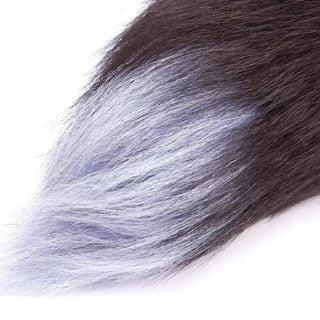 A visual of the 18 Seductive Wolf Tail in mysterious gray faux fur and durable stainless steel plug.
