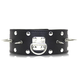 Experience a comfortable yet intimidating collar and leash set for BDSM play, with metal spikes and studs securely fastened.