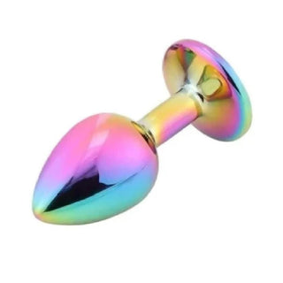 Rainbow-colored toy princess butt plug big made of metal with a smooth, tapered shape.