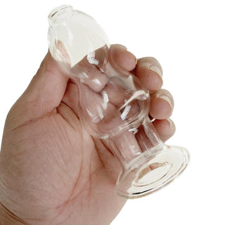 A detailed image of Clear Glass Ass-Gaping Hollow Butt Plug 4.53 Inches Long with tapered top and slender neck for comfortable insertion.
