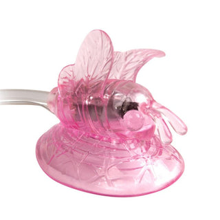 This is an image of Pink Butterfly Suction Clit Pump for intimate pleasure.