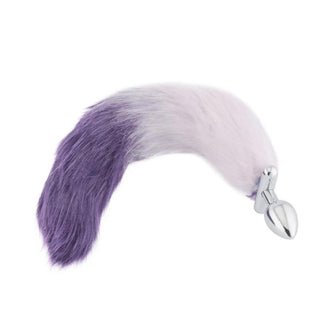 Take a look at an image of 18 Shapeable White With Purple Fox Tail Butt Plug Metal, displaying the top-grade stainless steel plug for durability and sensual weight.