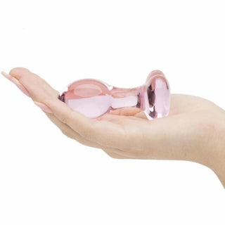 This is an image of Pink Crystal Butt Massager, made from tempered glass for safety and comfort, easy to clean and maintain.