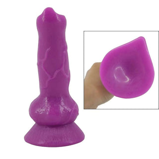 Photo of a dog cock-shaped dildo with a textured shaft, ideal for animal fetish fulfillment and hands-free riding.