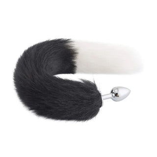 View the 18-Inch Black with White Fox Tail Plug Stainless Steel, an elegant accessory for intimate pleasures, designed for comfort and stimulation with an 18-inch lush tail and smooth plug surface.