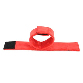 An image showcasing the red color and plush material of Super Comfy Red Ankle and Arm Foot Cuffs, designed for comfortable yet thrilling BDSM adventures.