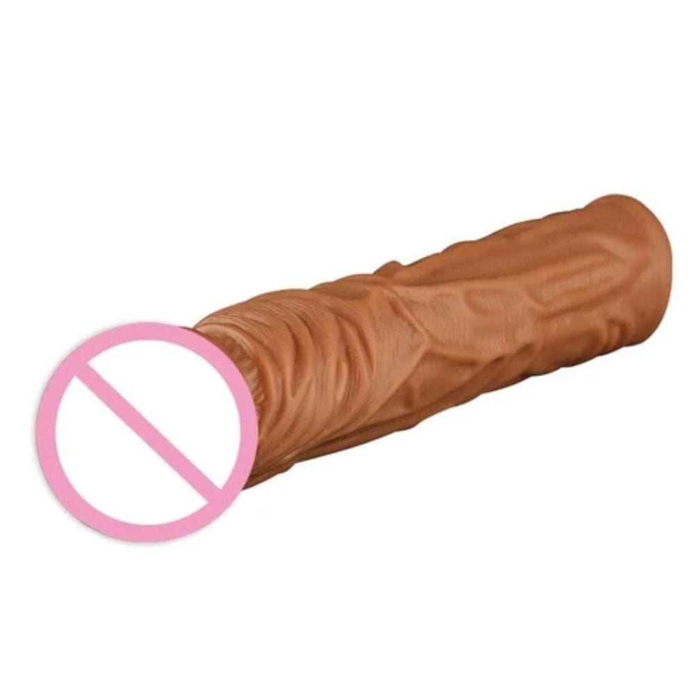 This is an image of Bigger Fantasies Penis Enlarger Sleeve in flesh color made from body-safe silicone material.