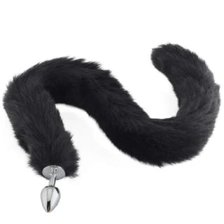 A detailed image of the luxurious 32-inch black faux fur tail swaying with movement, adding a kink to sensual play.