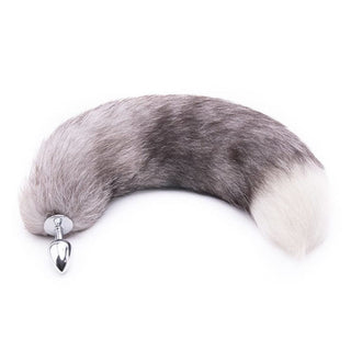 Feast your eyes on an image of Feisty Greyback Fox Tail Plug 16 Inches Long, displaying the options of silver or black plug and gray or white tail, catering to different preferences.