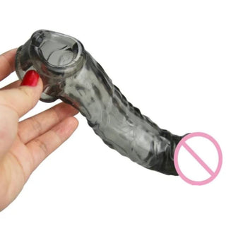 Thick flesh-colored penis extender sleeve for extended pleasure and heightened climax.