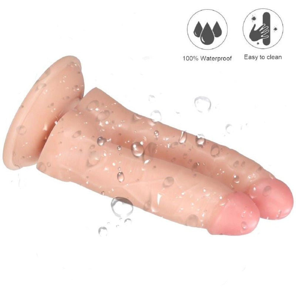 Flesh-colored double penetration dildo with two realistic dildos image.