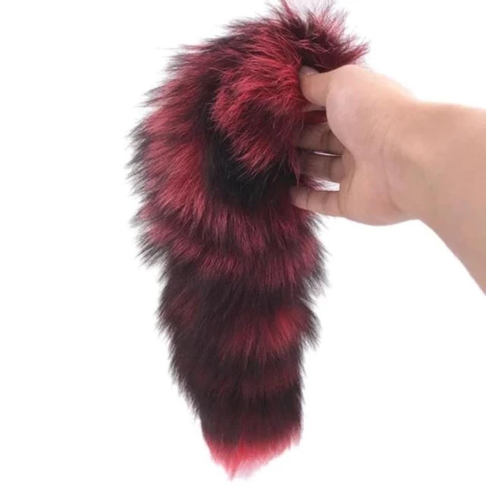 A detailed image of the red and black faux fur tail of the Black and Red Stripes Cat Tail Metallic Tail.