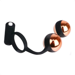 You are looking at an image of Vibrating Personal Trainer Weighted Ring displaying the unique design with weighted metal balls and single-speed ABS vibrator.
