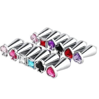 This is an image of Jeweled Steel Butt Plug Men Flared in silver with a pink jewel base.