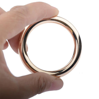 Experience the thrill of Gold Non-Vibrating Cock Ring | Penile Exerciser Gold Ring with its meticulous design for maximum pleasure.