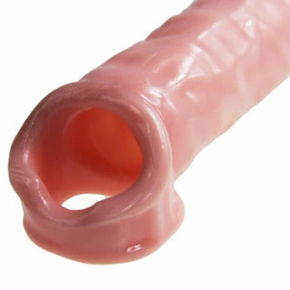 Observe an image of Performance-Enhancing Realistic Penis Extension with a ball ring for extended endurance and secure hold.