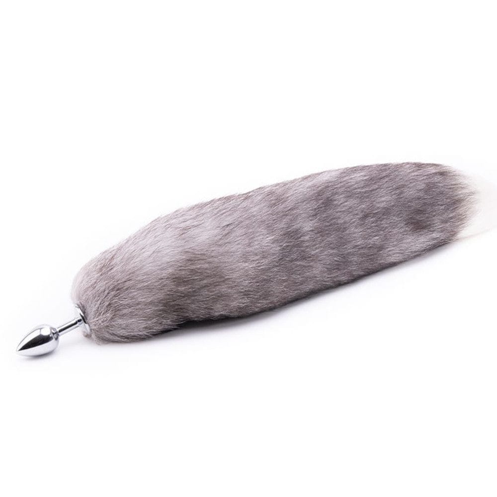 A picture of Feisty Greyback Fox Tail Plug 16 Inches Long, highlighting the high-quality, non-toxic materials used, including faux fur, stainless steel, and silicone.