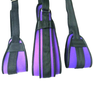 This image displays the Purple Leg Spreader Sex Swing with metal rods and adjustable width for secure and pleasurable experiences.