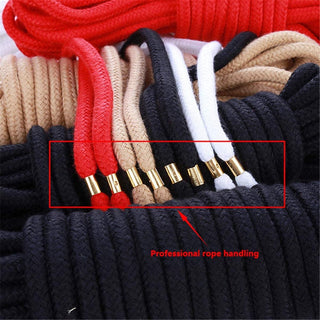 In the photograph, you can see an image of Soft Shibari Cotton Rope Play showcasing its soft cotton material for comfortable play.