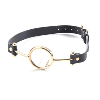 Sleek black leather belt with gold and silver ring on Tongue Suppression Circle Mouth Bondage Gear.