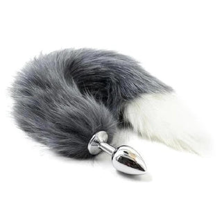 Feast your eyes on an image of Seductive Fox Tail Plug 17 Inches Long showcasing an ash gray faux fur tail.