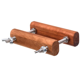 Wooden Ball Buster Compressor in brown and silver color, made from wood and metal materials.