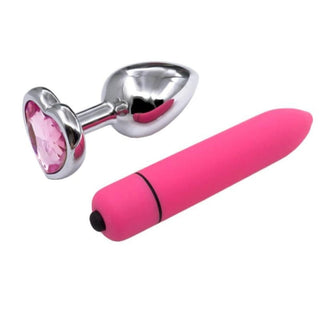 In the photograph, you can see an image of a pink and silver jeweled princess anal plug and vibrator set