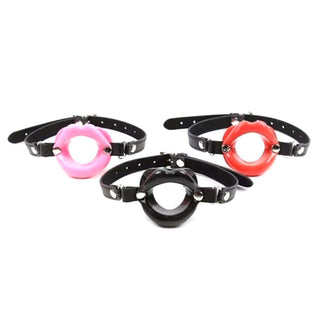 What you see is an image of a Slave Punishment Gag in seductive shades of red, black, and pink for heightened arousal.