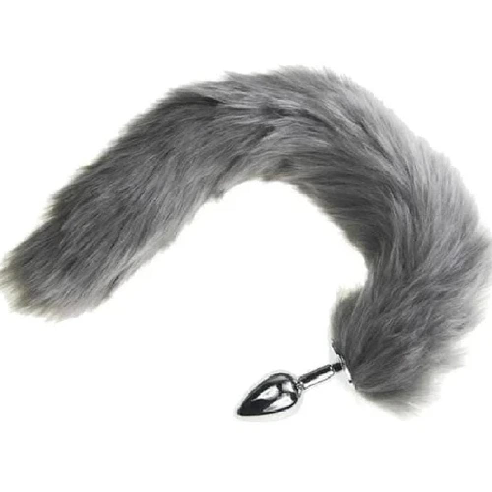 This is an image of Flirty Fox Tail Cat Tail 16 Inches Long Plug in purple color with a charming faux fur tail.