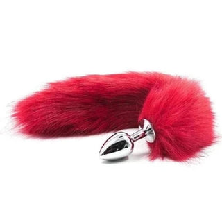 In the photograph, you can see an image of Seductive Fox Tail Plug 17 Inches Long presenting a red faux fur tail.