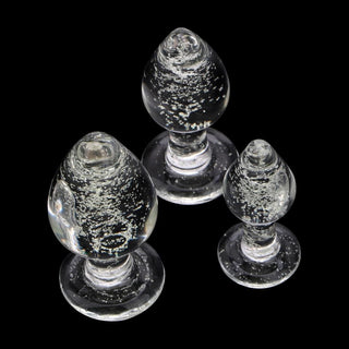 Radiant glow of glass butt plug set for heightened pleasure