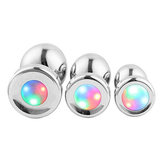 Featuring an image of Light Up Princess Jewel Anal Toy Set Trainer Men Beginner with three metallic plugs in different sizes.