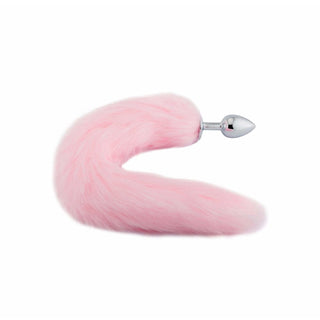 Solid stainless steel plug with tapered design for comfortable insertion, topped by a soft, fluffy faux fur tail.