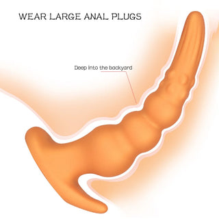 This is an image of Large Anal Massager with ribbed top half and beaded bottom half for heightened sensitivity.