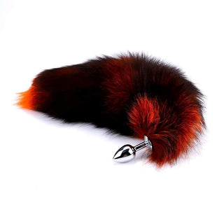 This is an image of the stainless steel and faux fur butt plug with a length of 2.95 inches, designed for beginners.