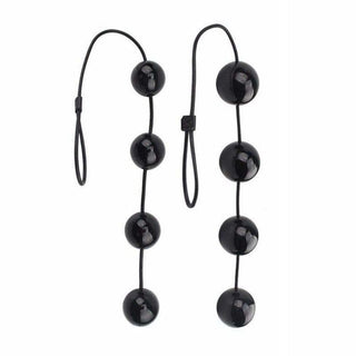 Take a look at an image of Blacked Out String Silicone Plug in black color with four silicone beads for ultimate pleasure.