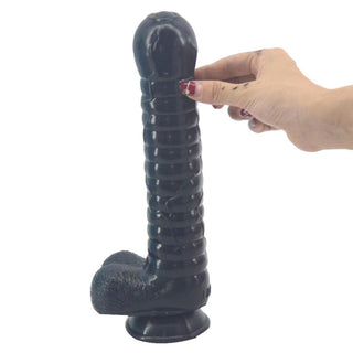 Check out an image of Glorious Staff Silicone 11 Inch Fantasy Dildo in flesh color, featuring its staggering size of 11 inches in length and 2 inches in width.