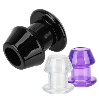 Check out an image of Peek-a-Boo I See You Tunnel Anal Plug in white, purple, and black colors, made of silicone.