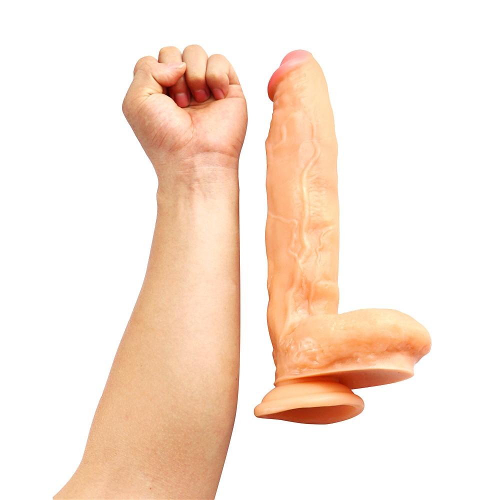 Check out an image of a large dildo with detailed manhood features, including a realistic head, veiny shaft, and hefty balls for enhanced pleasure.
