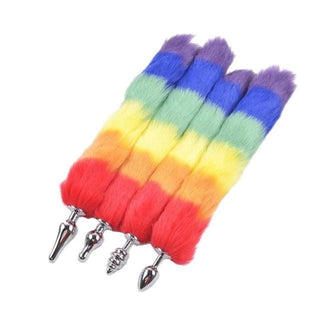 Check out an image of Rainbow-Colored Metallic Cat Tail Plug with faux fur rainbow tail and metallic plug designs.